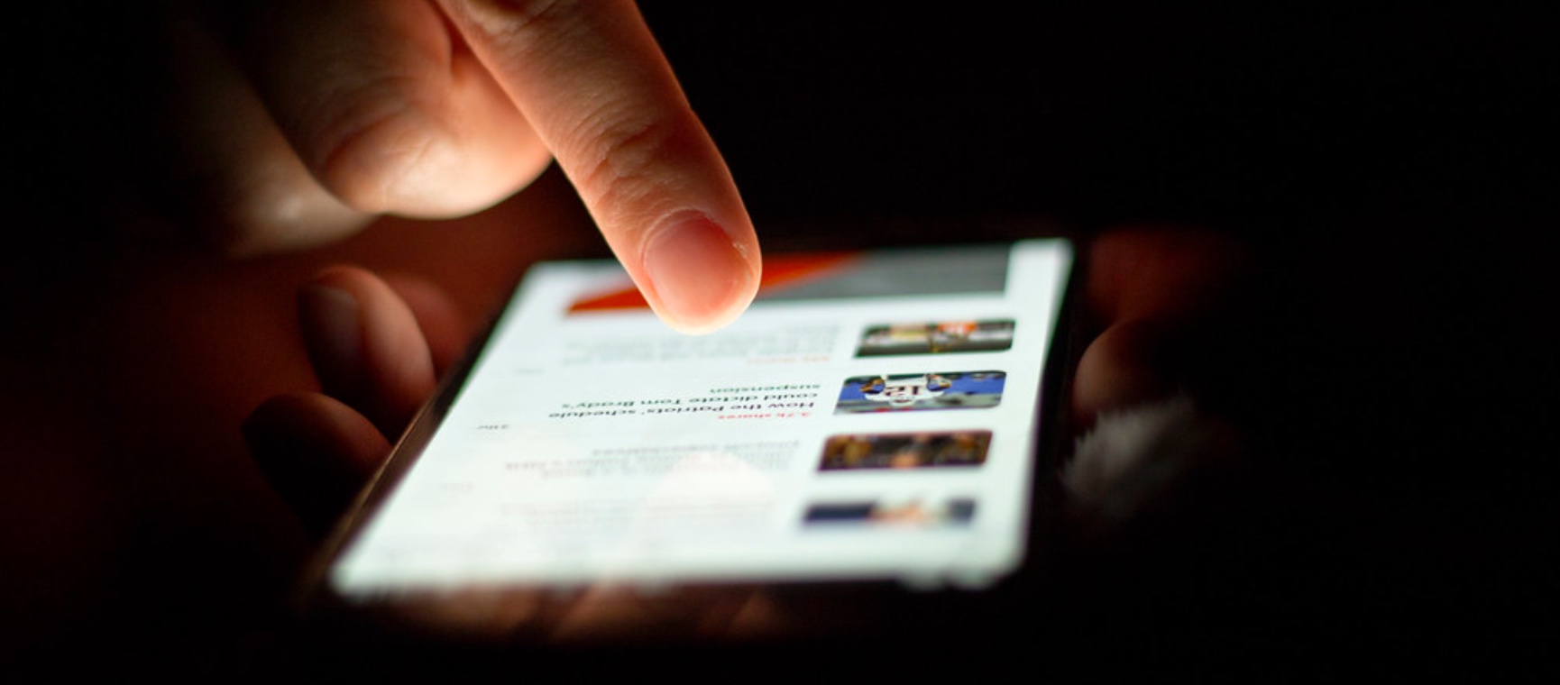 News scrolling on phone