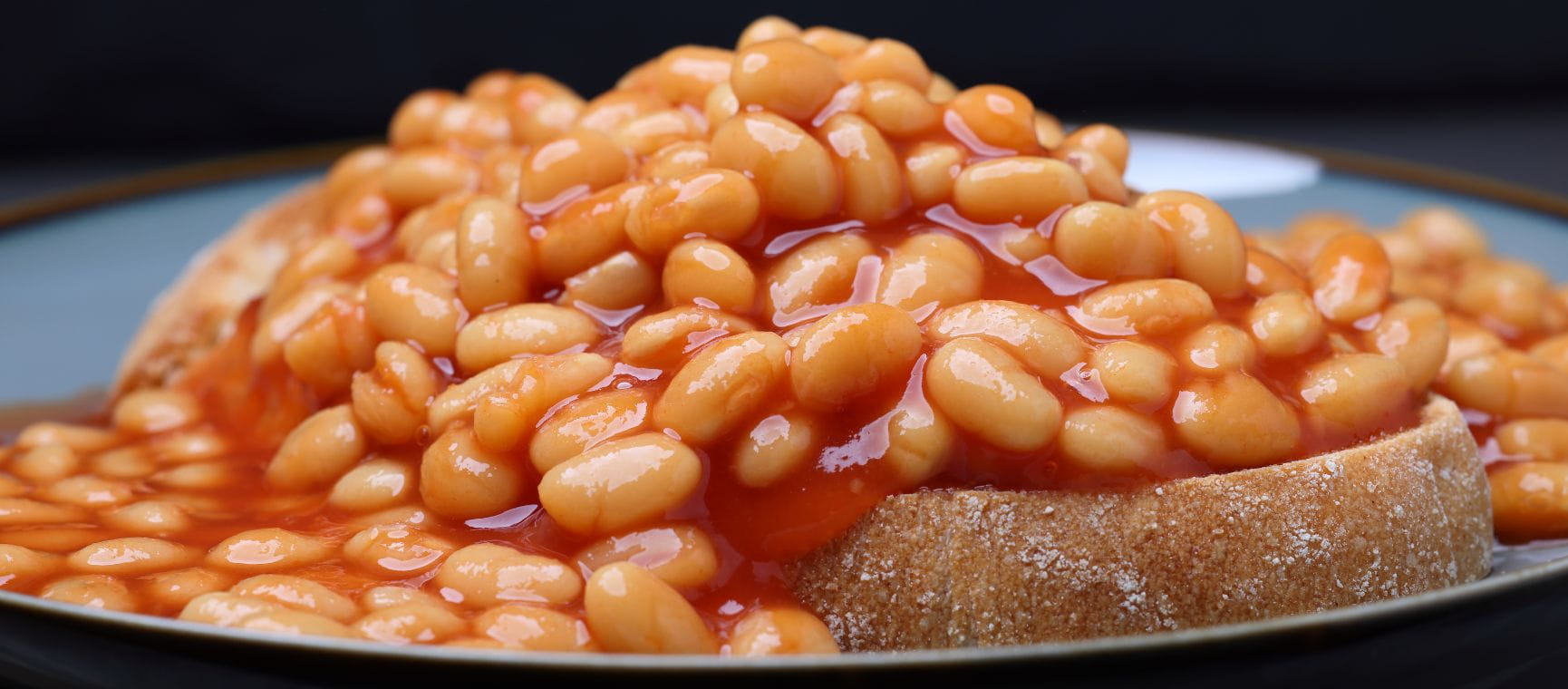 a close up of baked beans on toast