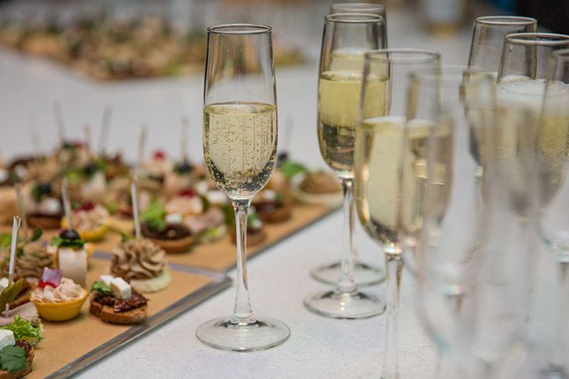 Glasses of champagne and canapés