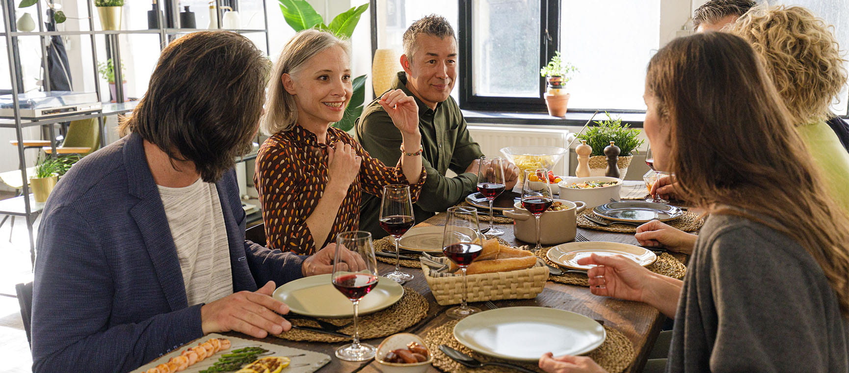 People enjoying a dinner party 