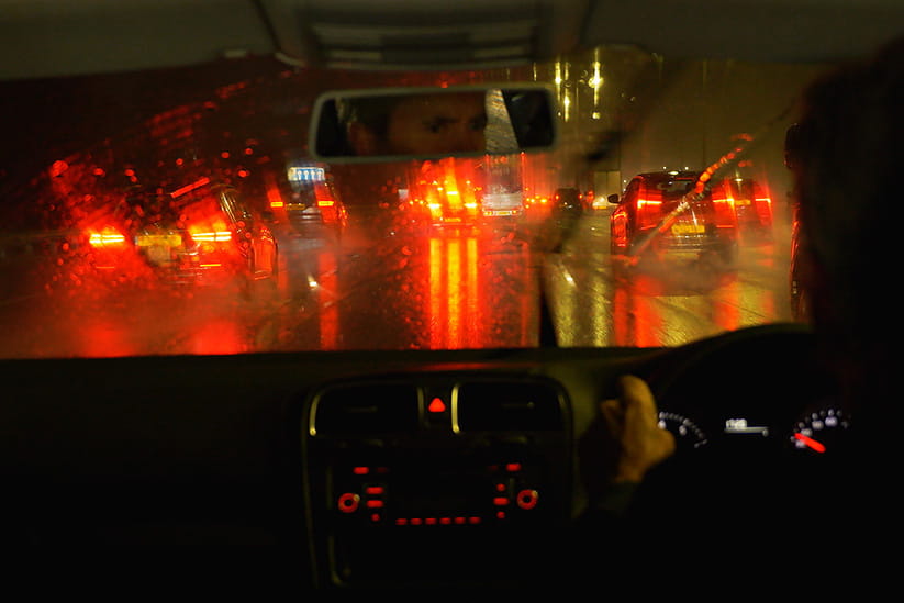 Blurry glare from tail lights while driving in the dark