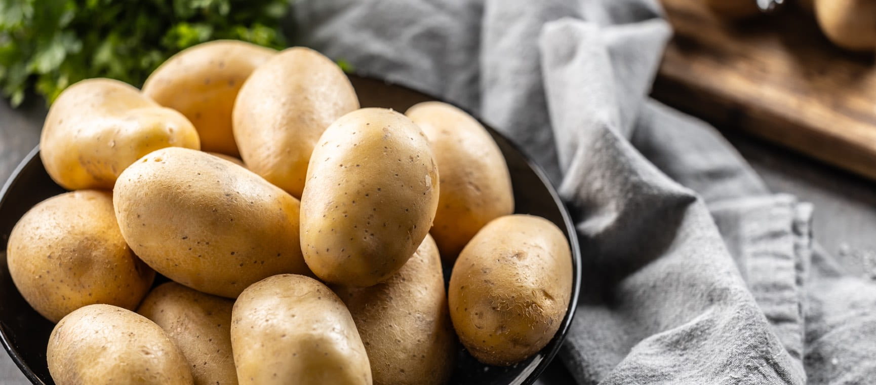 Bowl of uncooked potatoes