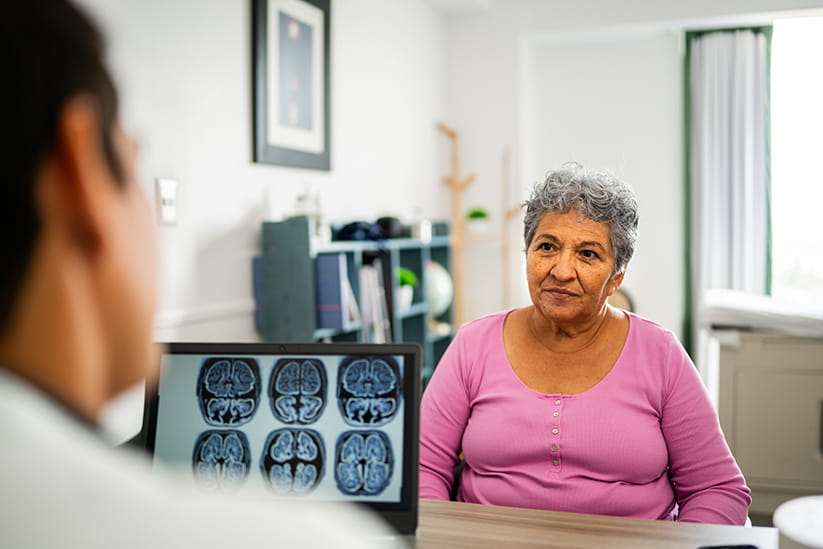 A woman having a consultation with a medical professional about brain health