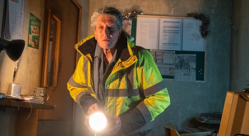 Ghost Stories man in high vis jacket with torch