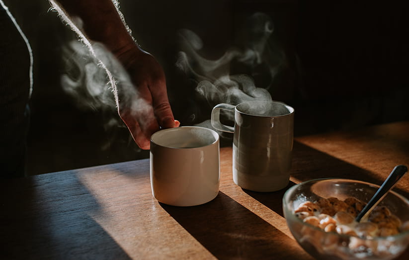 A steaming mug of coffee