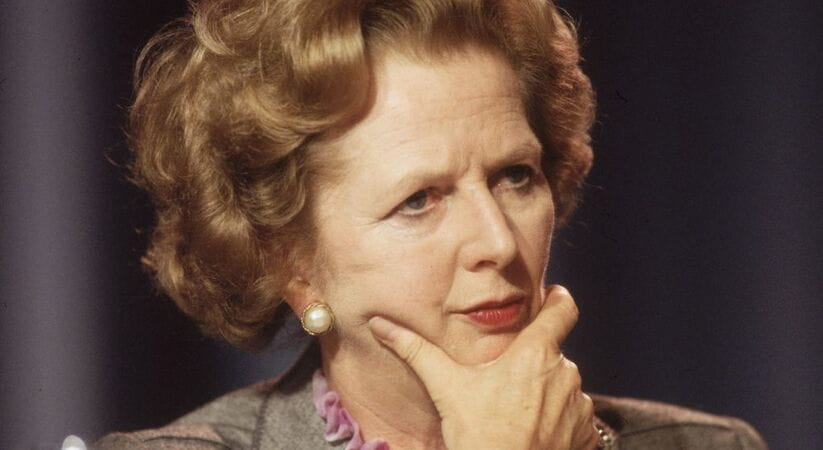 Margaret Thatcher holding her hand to her chin