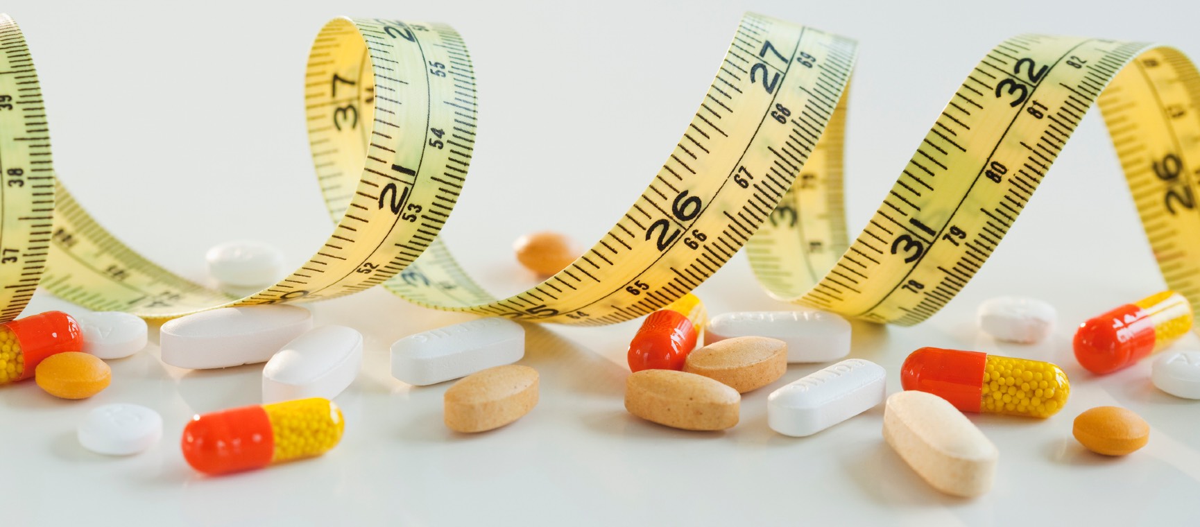 Tape measure with dietary pills