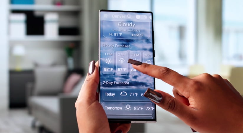 Person looking at a weather app on phone