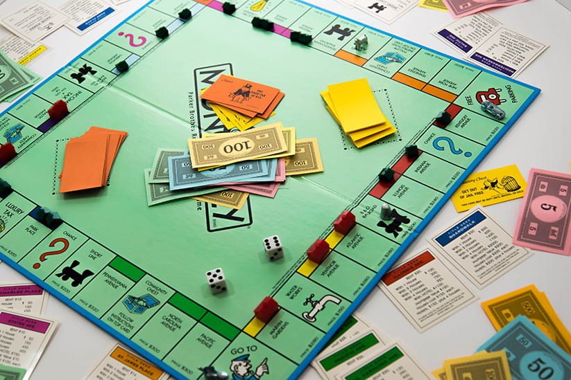 Monopoly board with money in the middle