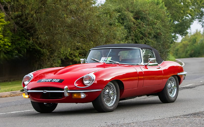 A red 1969 Jaguar E-Type convertible