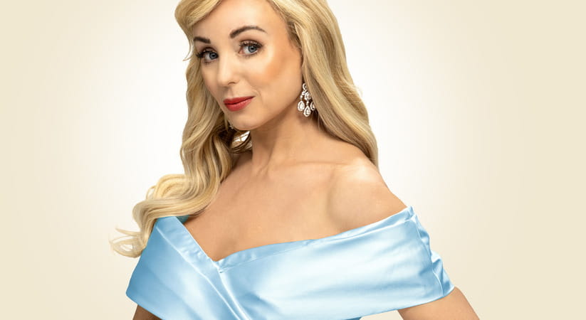 Helen George in a low slung blue dress