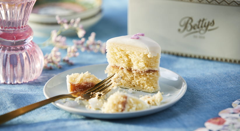 Half eaten slice of Bettys fondant fancy cake