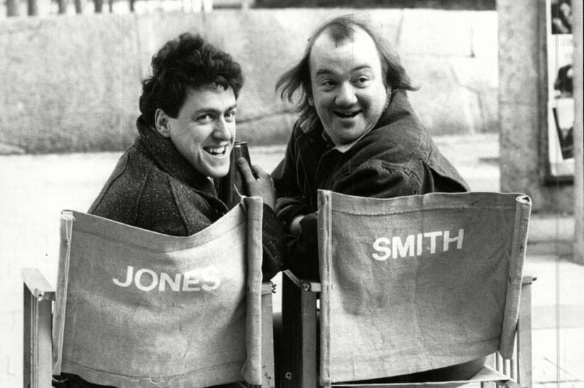 Black and white photo of Griff Rhys Jones and Mel Smith in actors chairs