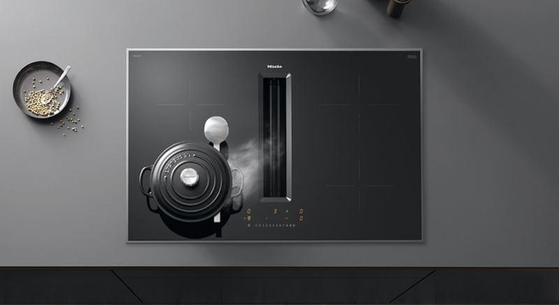 Aerial view of black Miele downdraft extractor hob