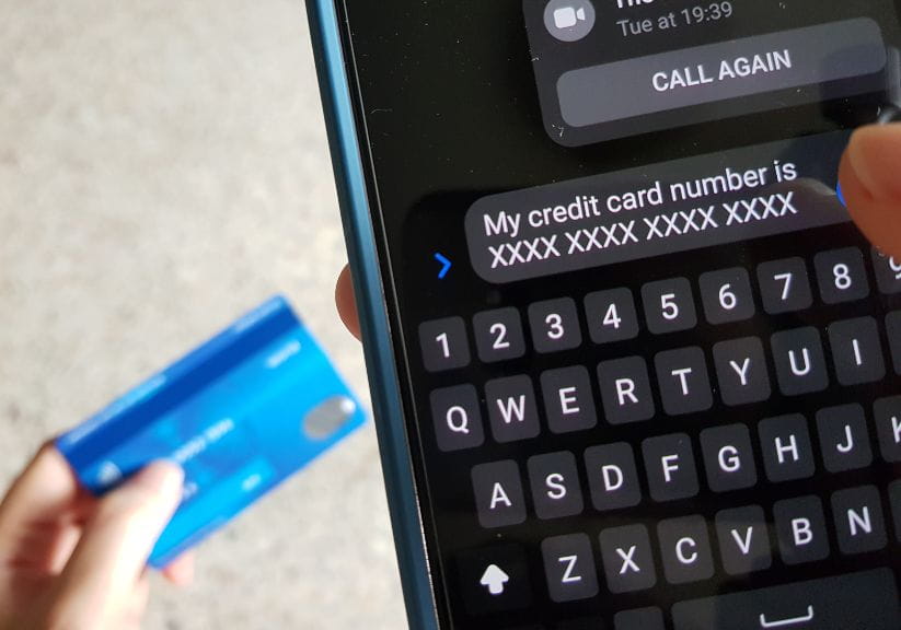 A person paying via a mobile phone