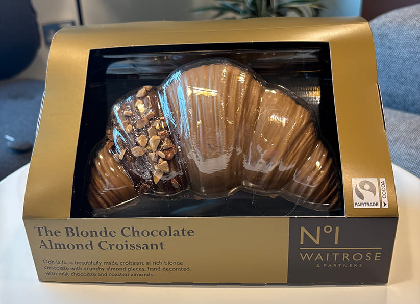 The Waitrose Croissant easter egg inside its packaging