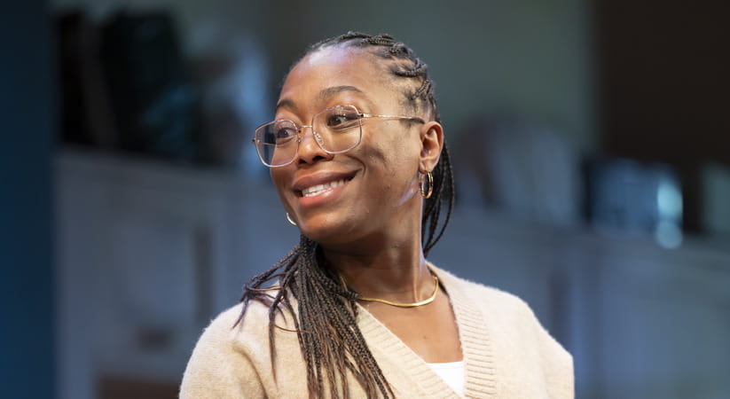 A smiling Stephanie Levi John in the stage show I'm Sorry Prime Minister