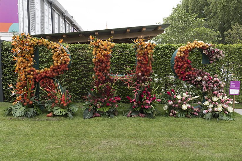 The letters RHS made out of a flower display