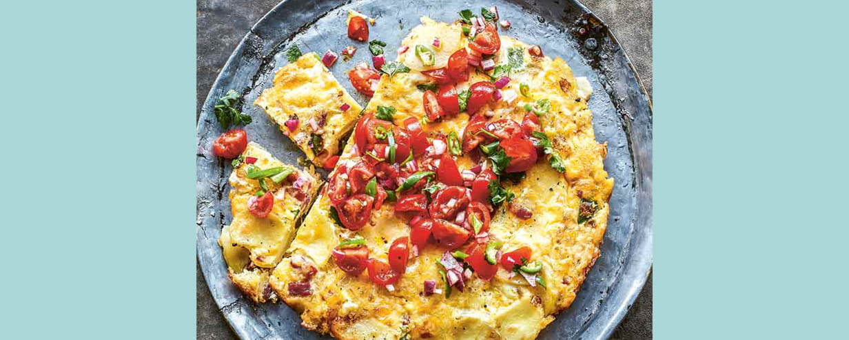 Spanish omelette topped with a fresh salsa