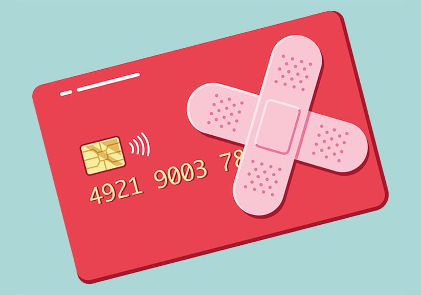 An illustration of a credit card with plasters stuck to it