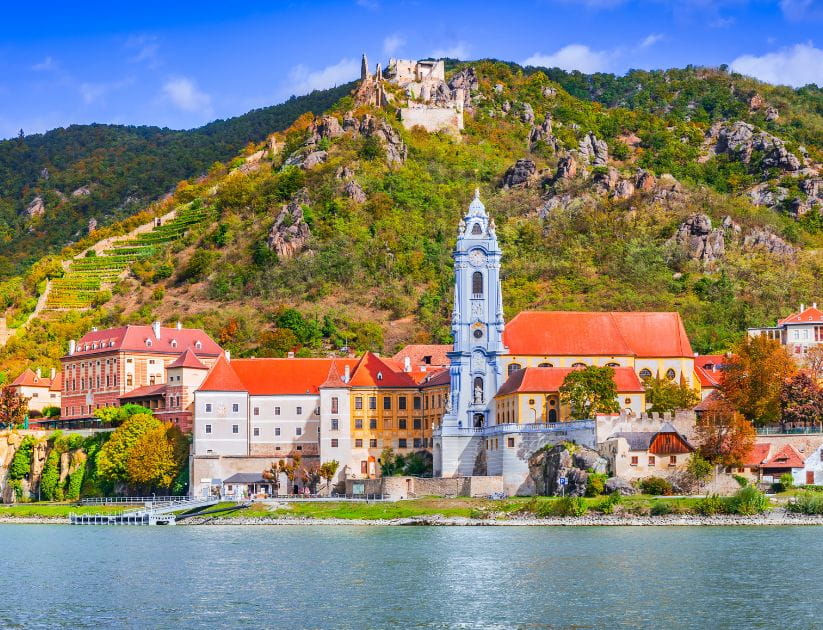 Durstein, golden vineyards cascading down hillsides and the medieval ruins above the danube river