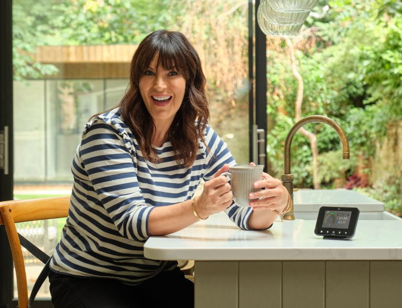 Anna Richardson smiling at the table