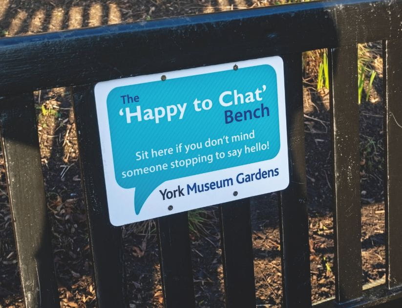 A picture of a bench from the happy to chat movement and the british heart foundation