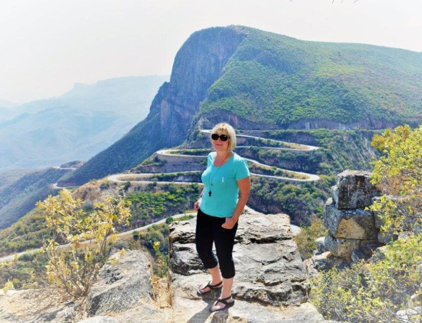 Sue Rogers on a mountain path in angola