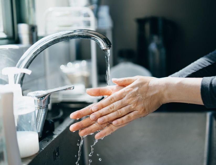 Person washing their hands