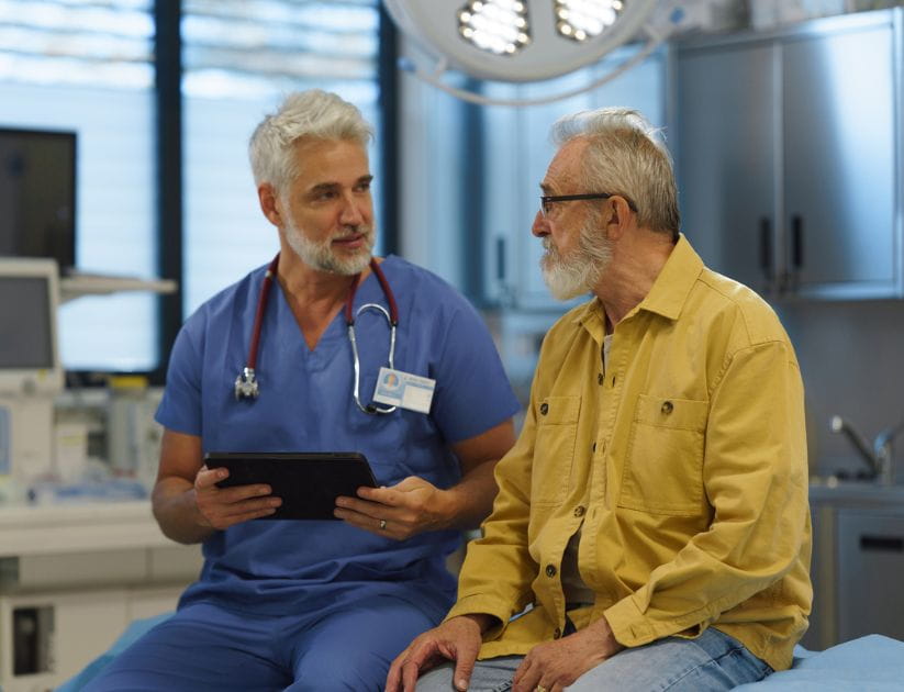 Man talking with doctor