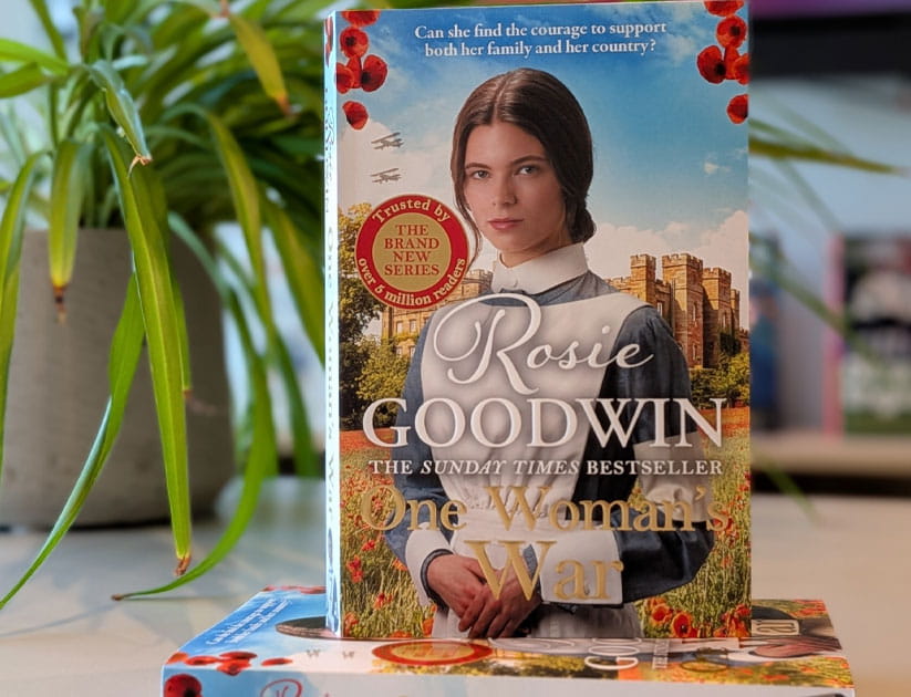 Rosie Goodwin's latest book 'One woman's war' on a table with a houseplant in the background
