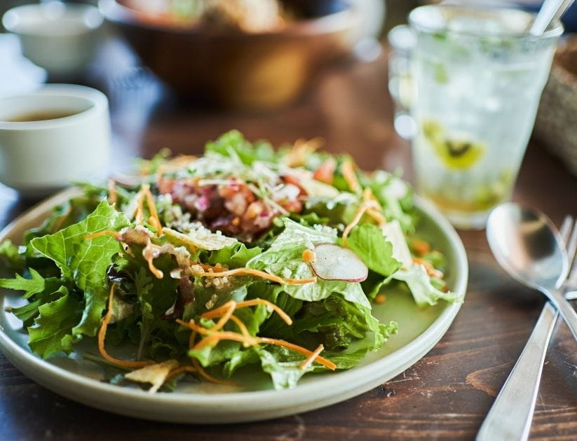 A serving of green salad from a vegan cafe