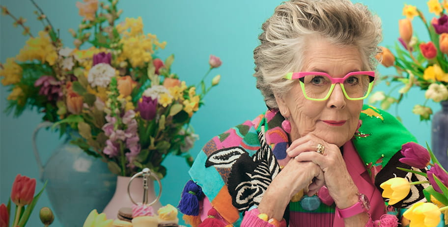 Prue Leith surrounded by flowers