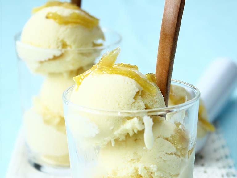 Scoops pf ice cream with pieces of stem ginger