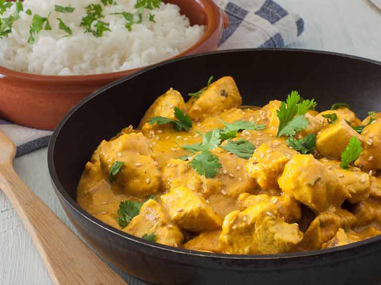 Chicken and coconut curry with mango and Indian spices