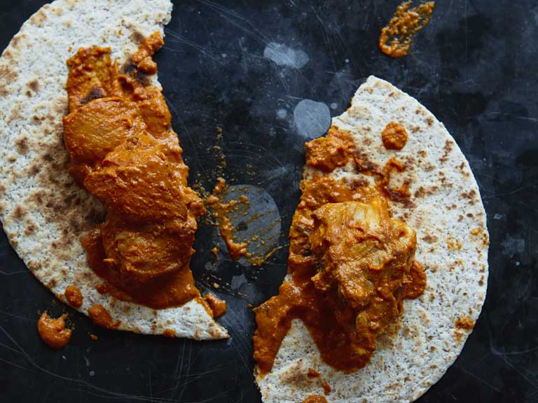 Chicken curry on a flat bread