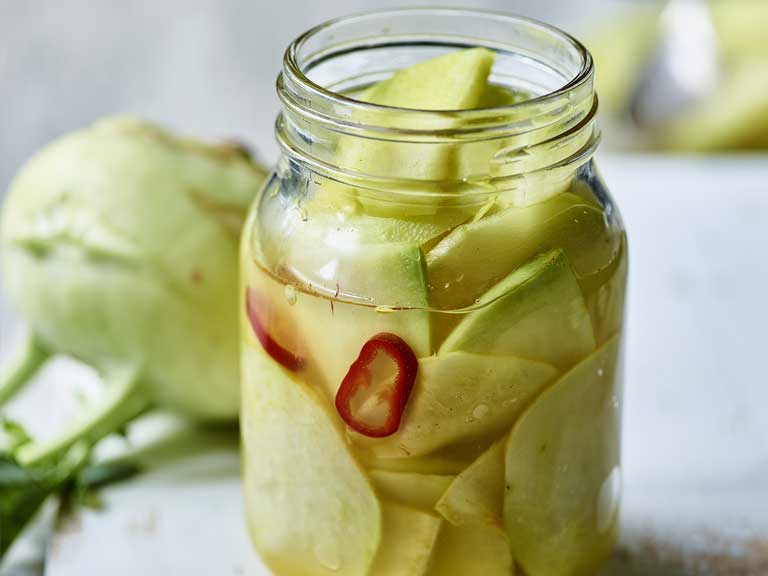 Jar filled with pickled kohlrabi