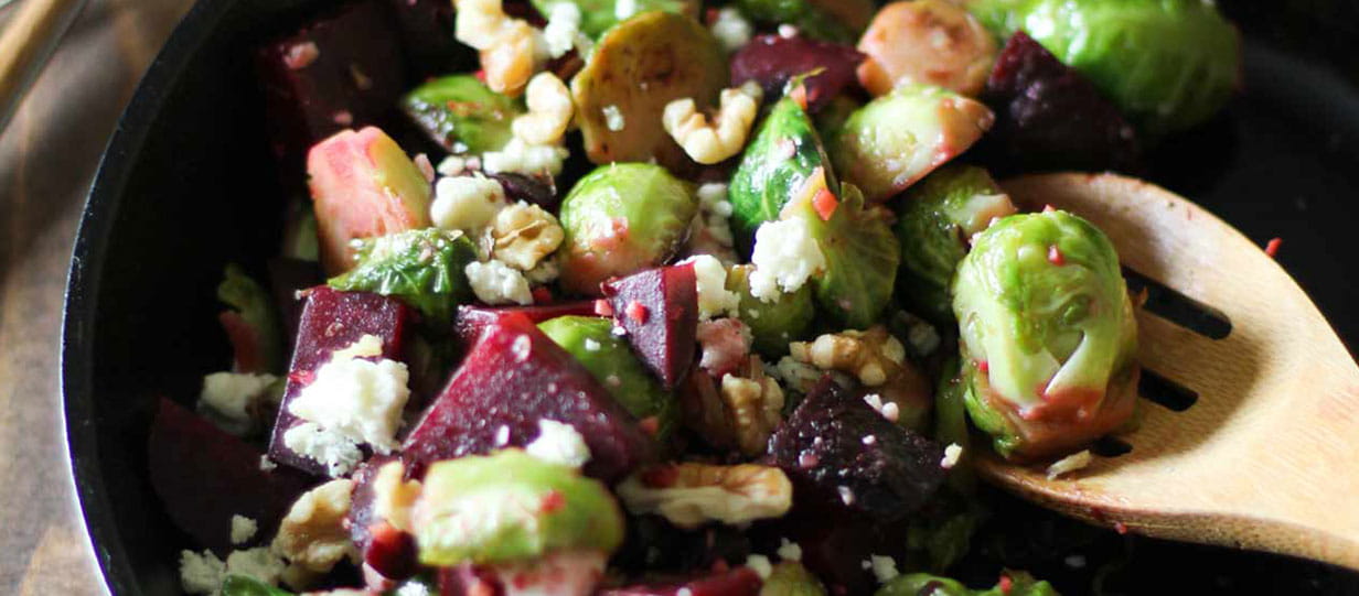 Honey-glazed Brussels sprouts with beetroot, blue cheese and walnuts