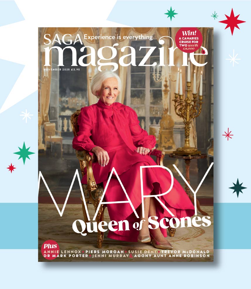 A print magazine, a puzzle book and a Parker jotter pen in front of a Christmas cracker