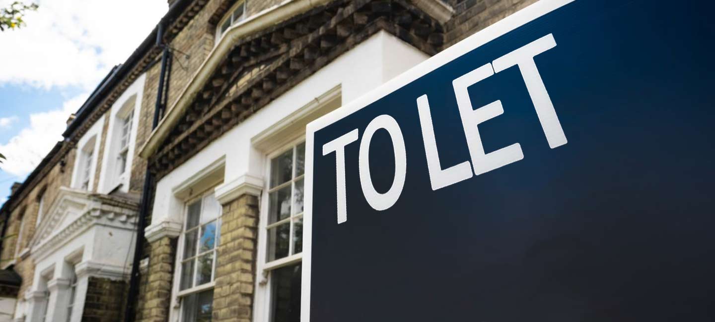 'To Let' sign outside a house