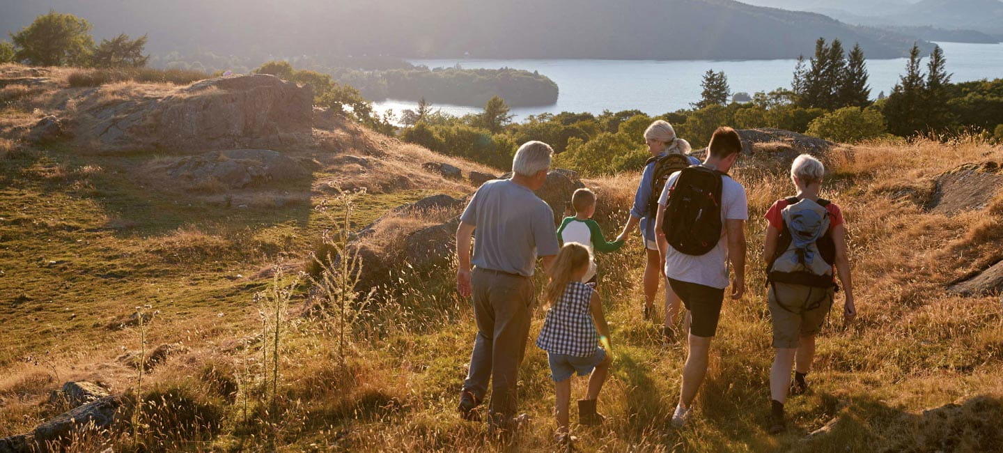 A family walking in the hills in the Lake District