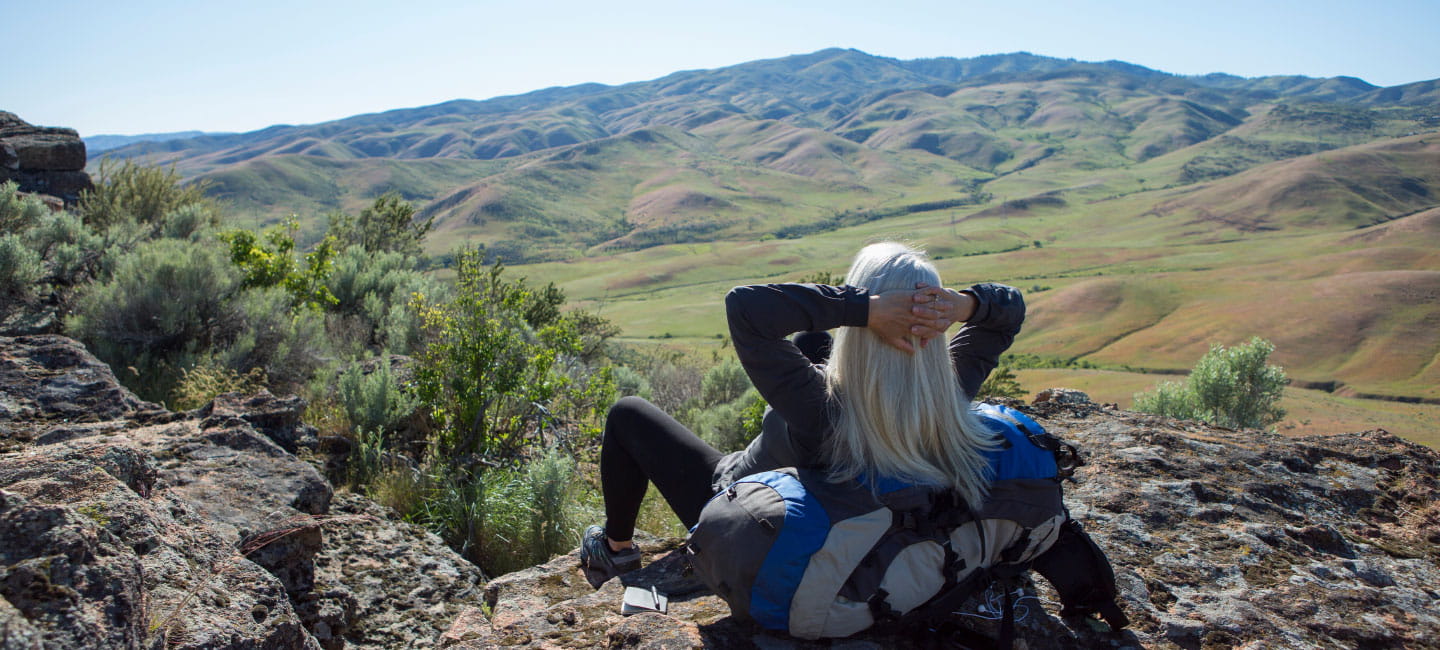 A hiker relaxing and taking in the view