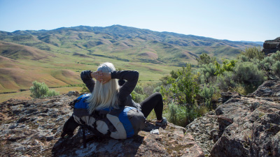 A hiker sitting back and taking in the view