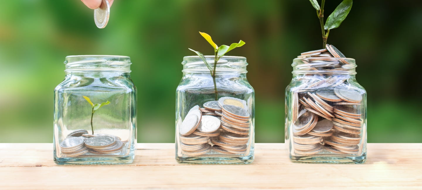 Three jars full of coins 