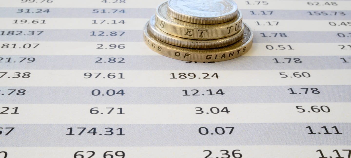 Coins on top of spreadsheet