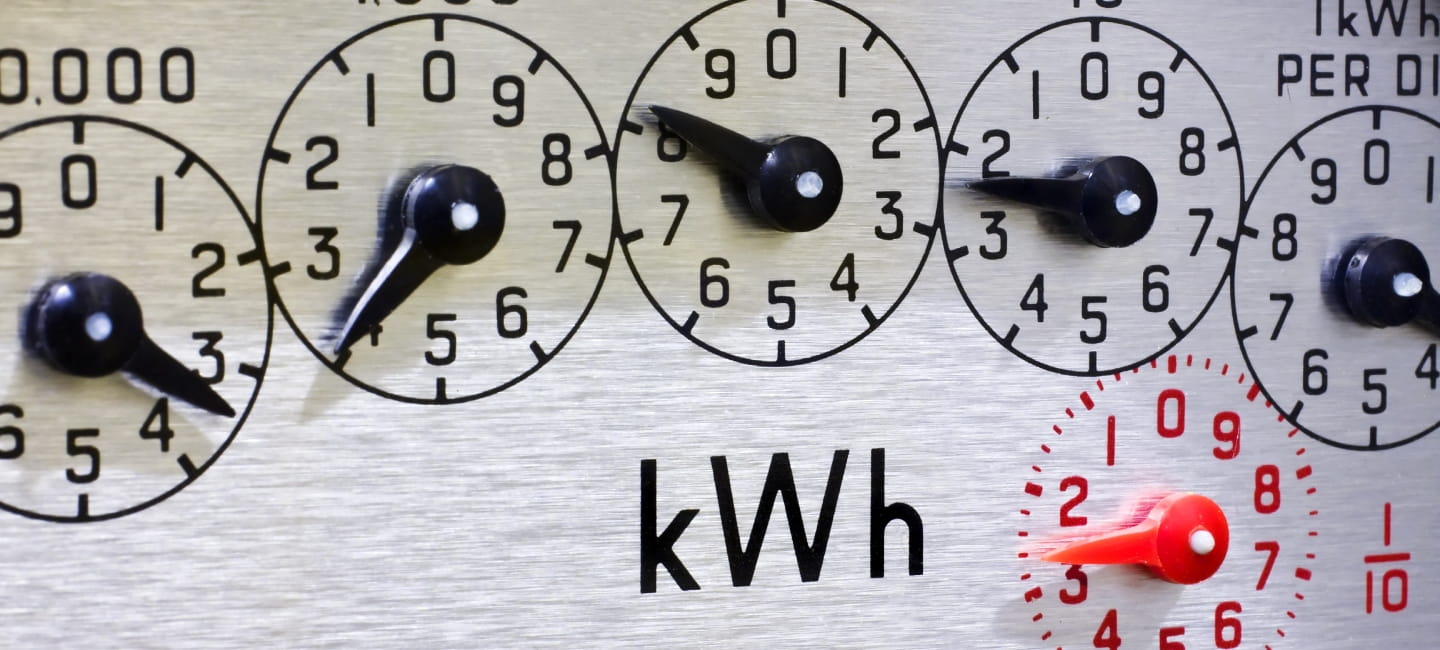 Electric Meter Dials close-up. Concept for cost of living, price rises, inflation, heating the home, meter reading and winter fuel allowance.