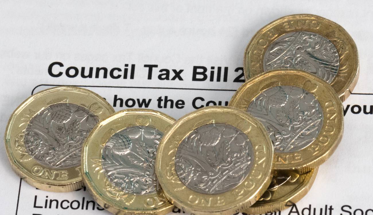 New pound coins on a council tax bill