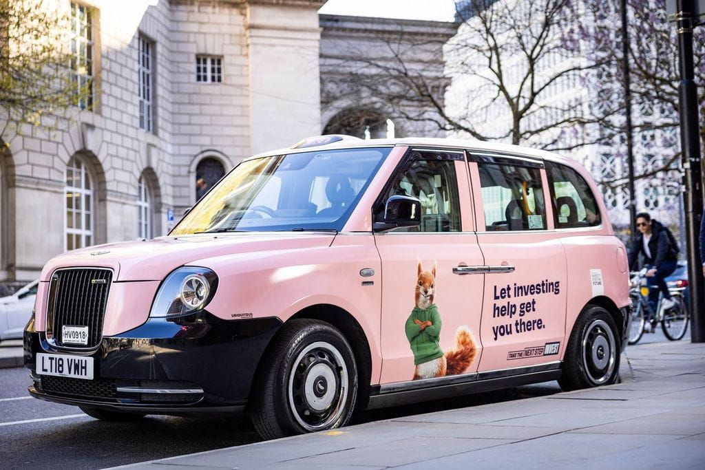 Pink cab with PR squirrel wanting brits to invest