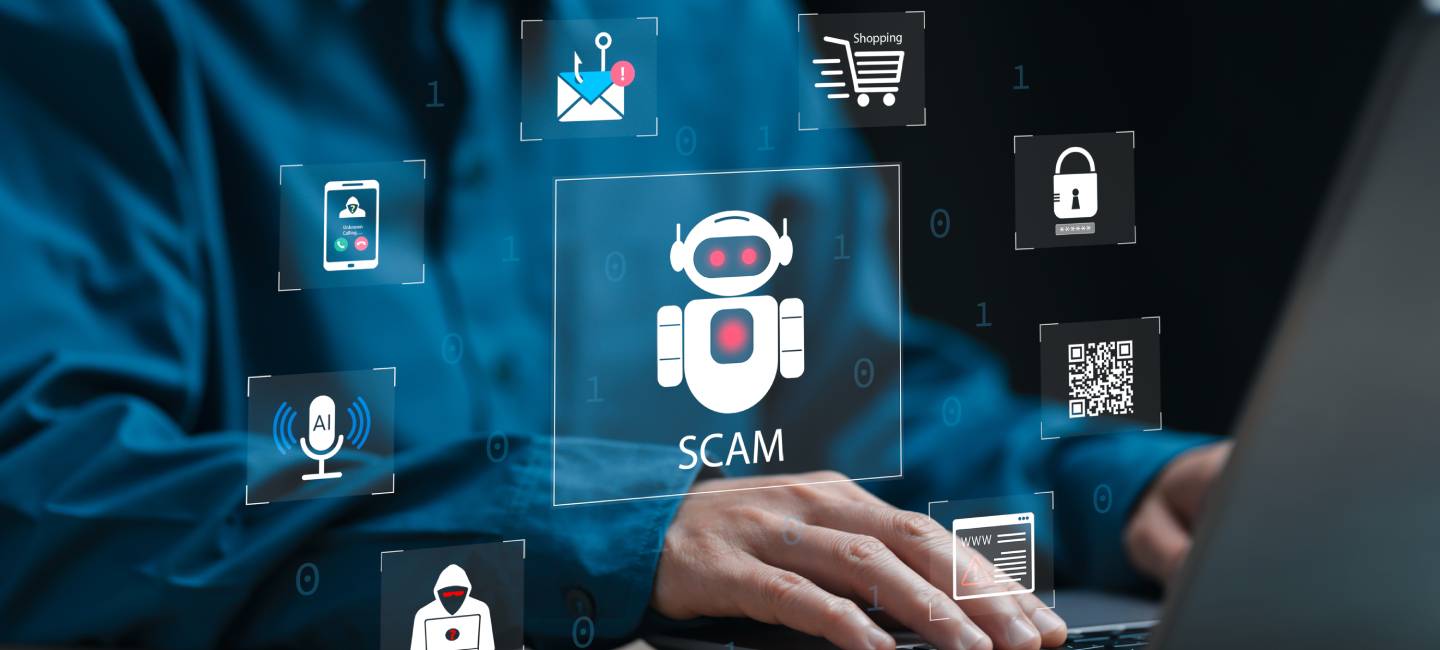 A person sitting at a laptop hacking data from online site