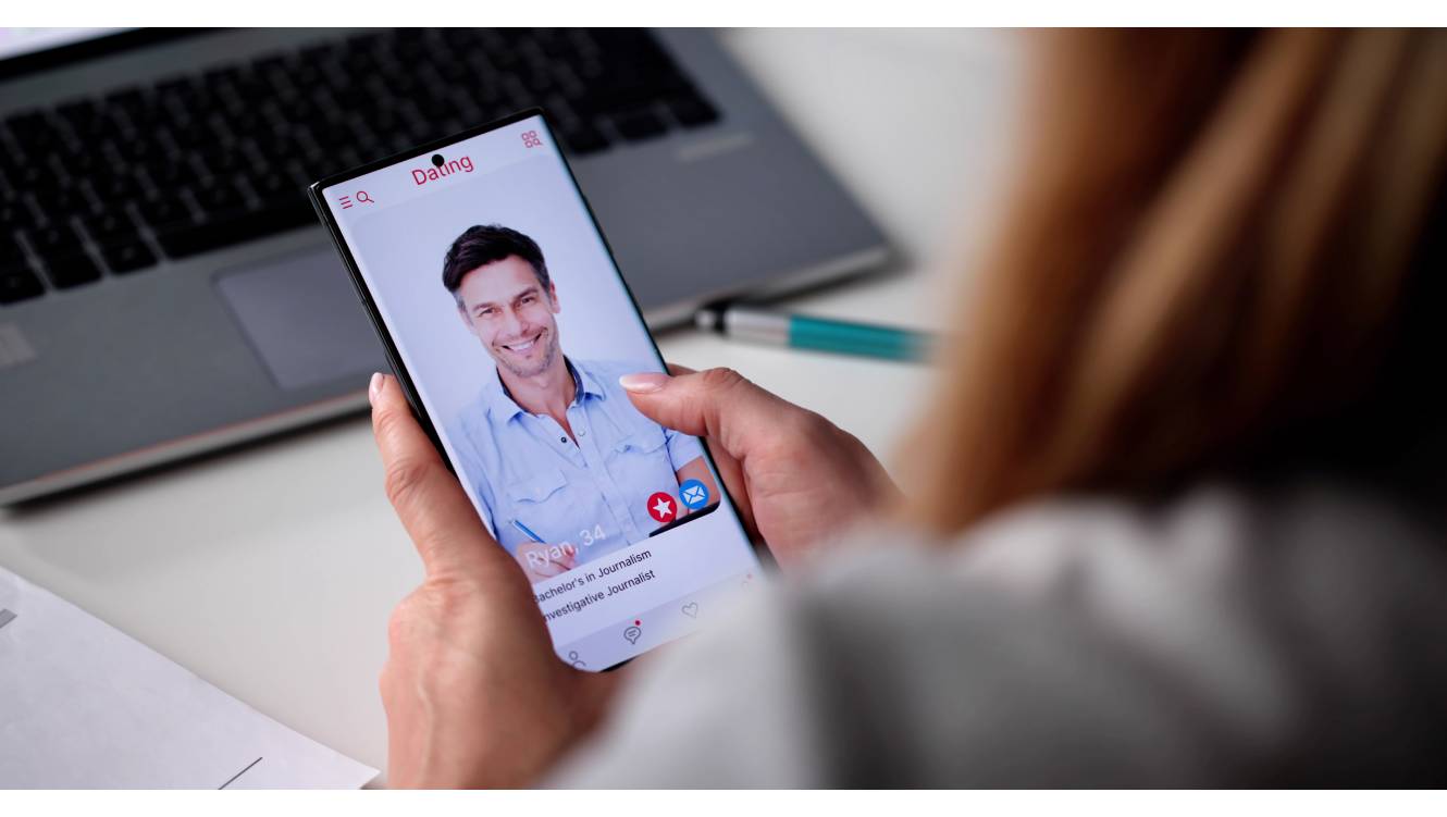 A mature woman swiping on a dating app